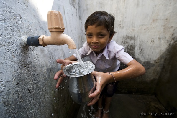 child-gathering-water
