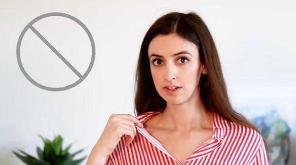 Woman on camera in a red striped shirt with an expression of uncertainty