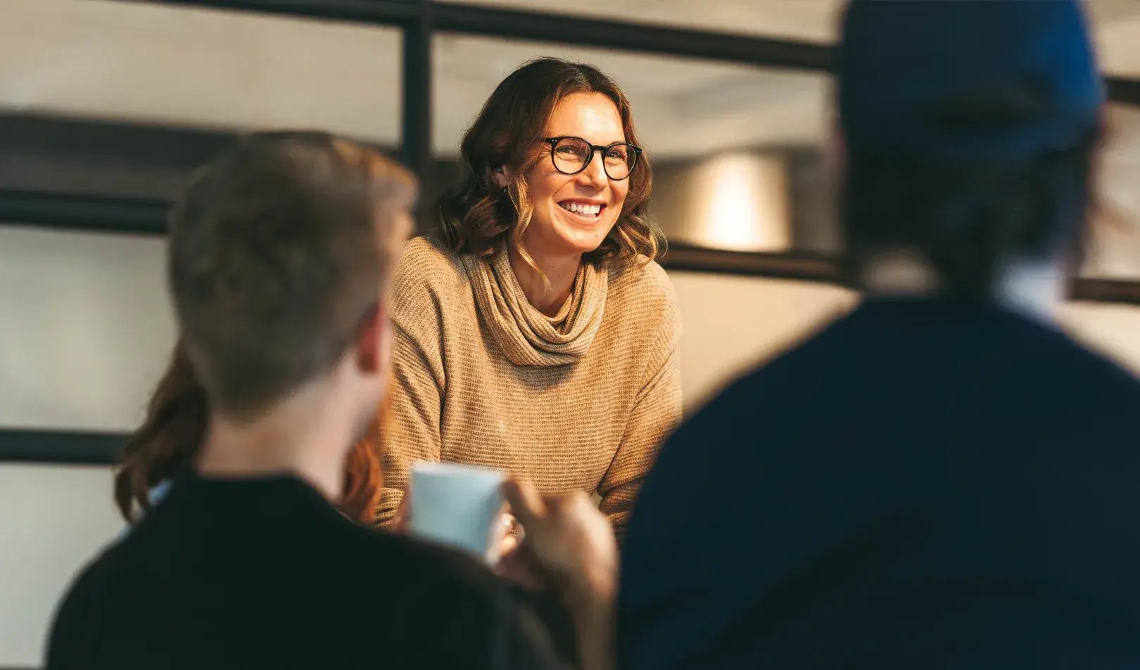 a_diverse_group_of_colleagues_engages_in_conversation