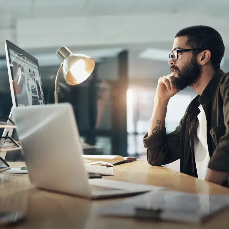 young_businessman_using_a_computer