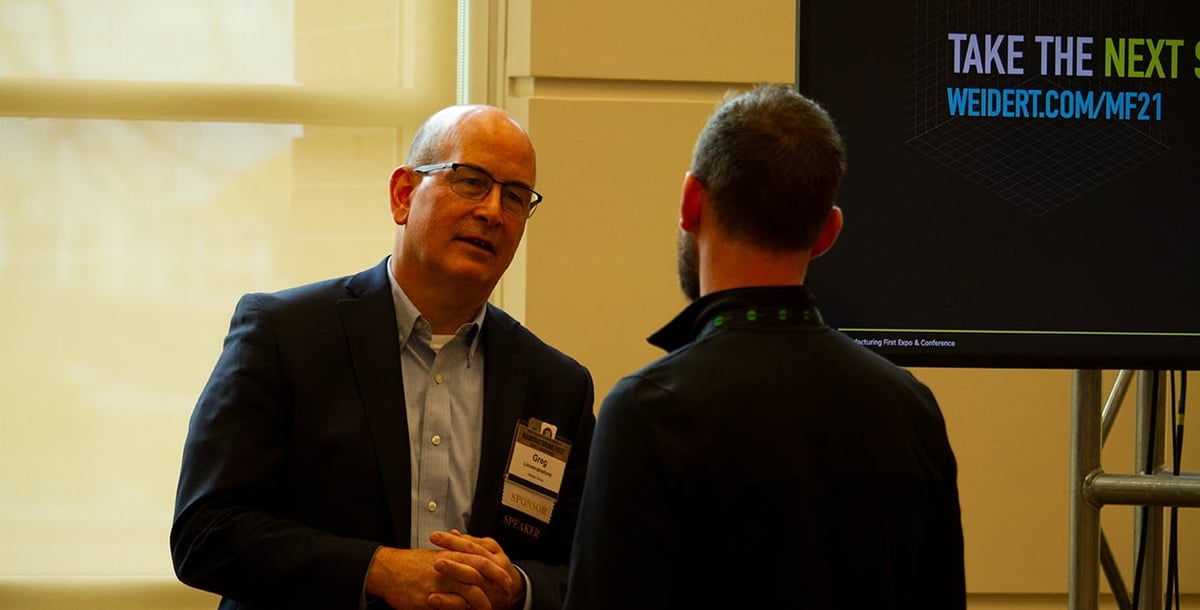 Manufacturing first conference attendees speaking