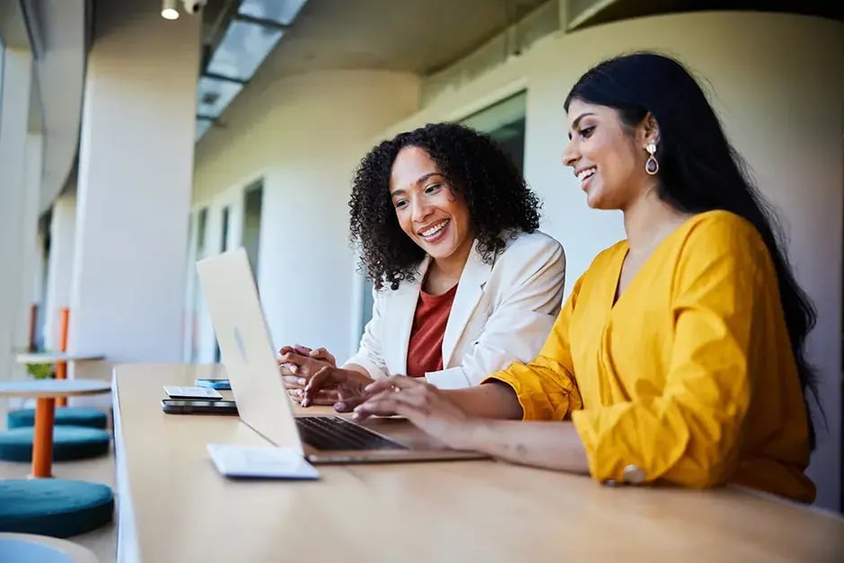 two women laptop