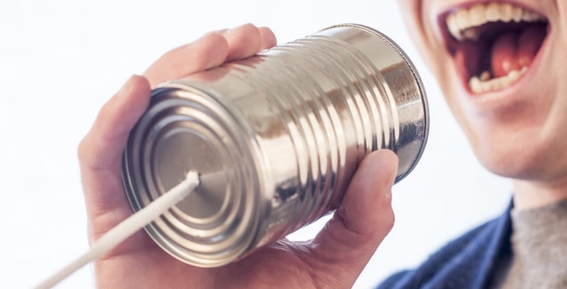 Man-with-can-telephone
