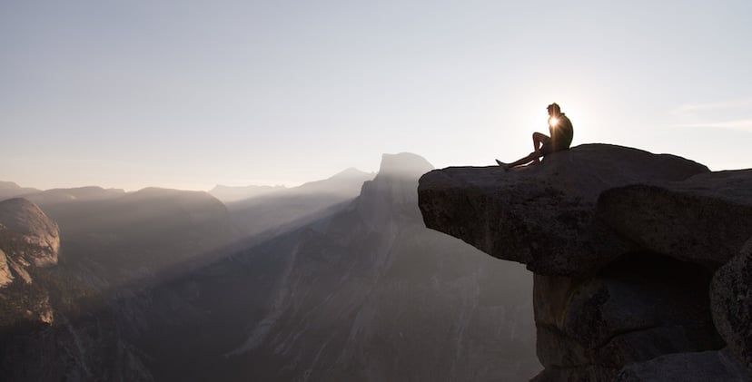 sitting-and-thinking-on-cliff