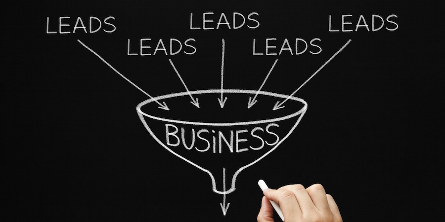 Chalk board showing a business funnel. Leads at the top point to the funnel.