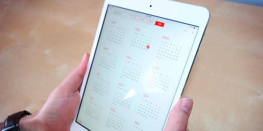 iPad with a calendar app open showing an entire calendar of 2015. February 21st is highlighted.