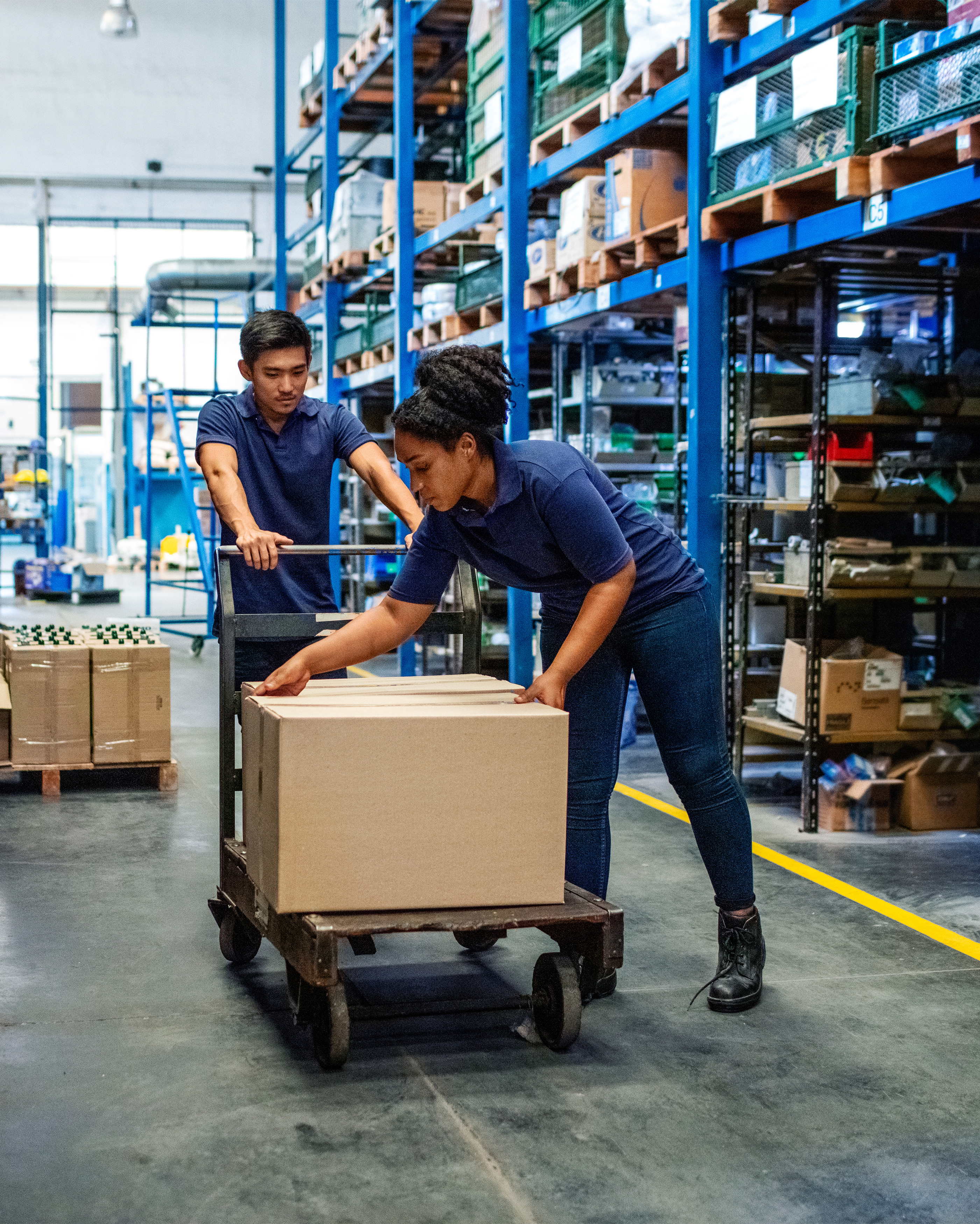 man-and-woman-working-in-warehouse