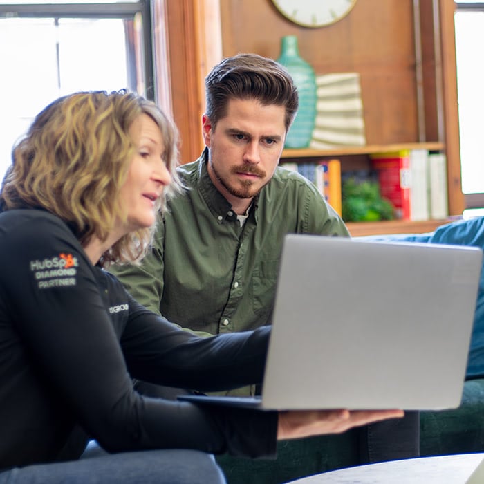 weidert employees looking at a laptop