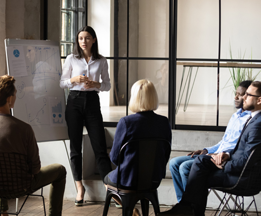 office_group_in_front_of_whiteboard