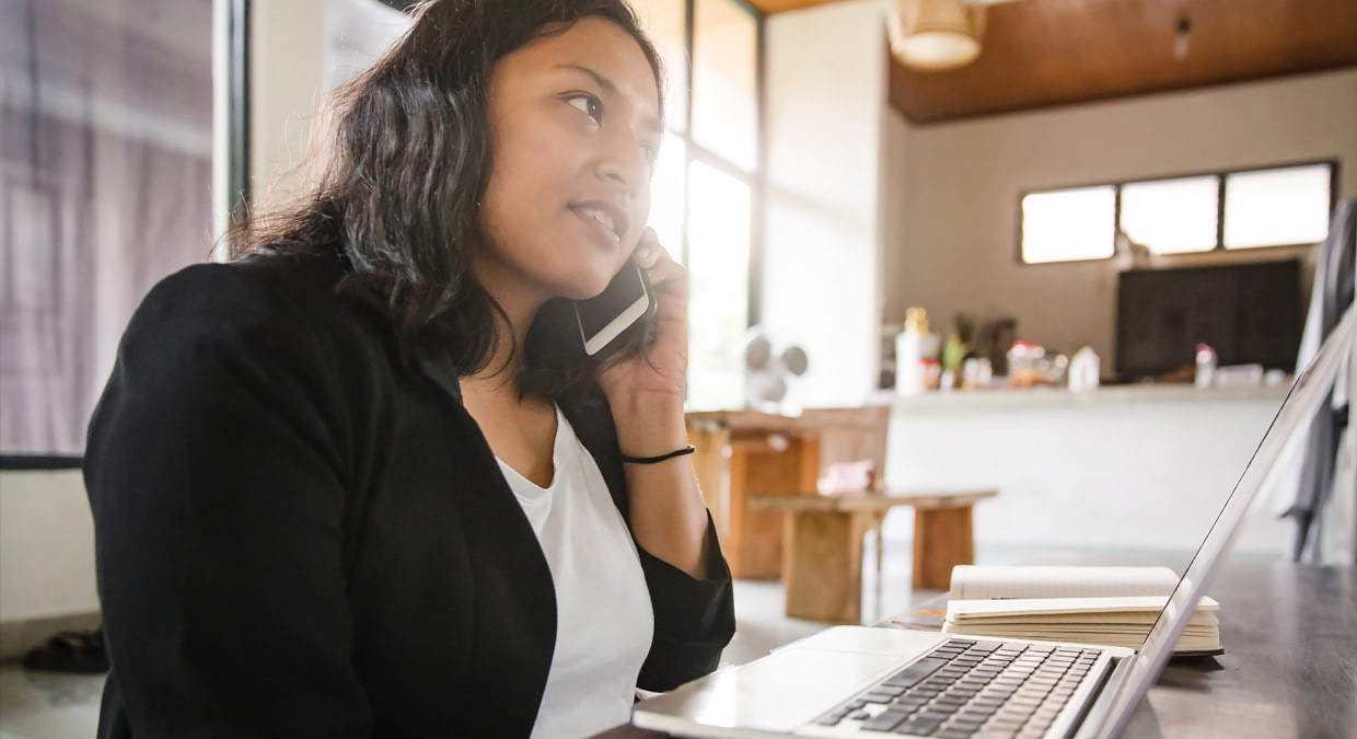 job_seeker_women_on_phone_and_laptop