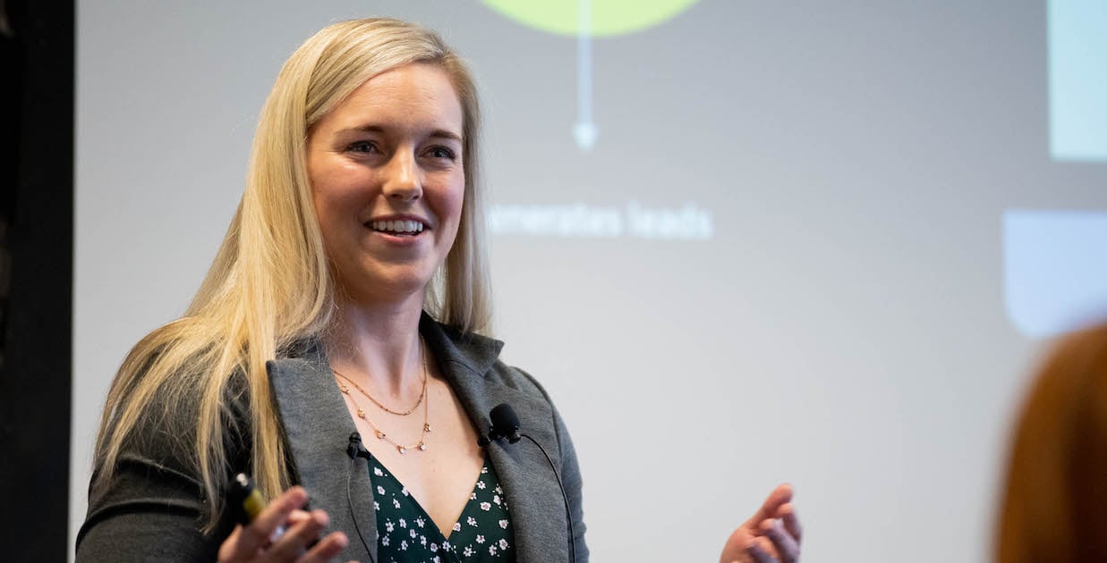 https://65360.fs1.hubspotusercontent-na1.net/hubfs/65360/2024-New-Site/Images/2025-blog-images/chelsea-drusch-speaking.jpg
